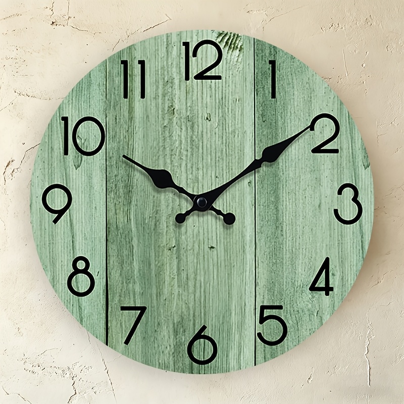 Lighting Home Decor Wall Clocks - Une horloge murale ronde avec motif